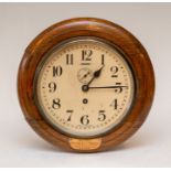 A twentieth century oak wall clock of Masonic interest, circa 1950. Beneath the face, an inscription