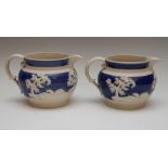 Two large Chetham and Woolley feldspathic stoneware mist-type jugs, circa 1810. Each is decorated