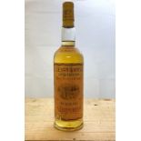 A bottle of 10 year old Glenmorangie single malt Highland whisky, a boxed bottle of Sake and several