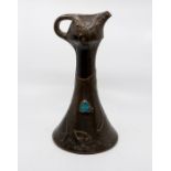 A Bretby art pottery bronzed ewer with 'cloisonne' decoration of birds on branches, No. 1584. 32