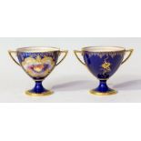 A pair of Royal Worcester two handled vase, blue cobalt ground, hand painted fruit studies to
