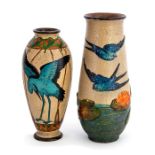 Two Bretby Art Pottery vases moulded with ornithological scenes and decorated in colours on a