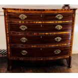 A George IV crossband mahogany chest of drawers, circa 1825, bow front ebonised and satinwood