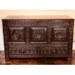 A late 17th Century oak mule chest, circa 1680, rectangular hinged top above the front extensively