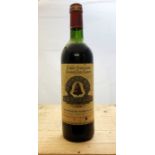 A bottle of 1978 Chateau L'Angelus Saint-Emilion Grand Cru Classe.   Description: Quantity: 1 bottle