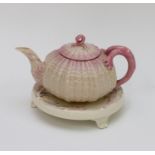 Two pieces of late nineteenth century Belleek, circa 1870-90. Comprising of a teapot and cover