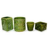 A group of Bretby art pottery green glazed planters with floral, basket-weave and Chinese cooking