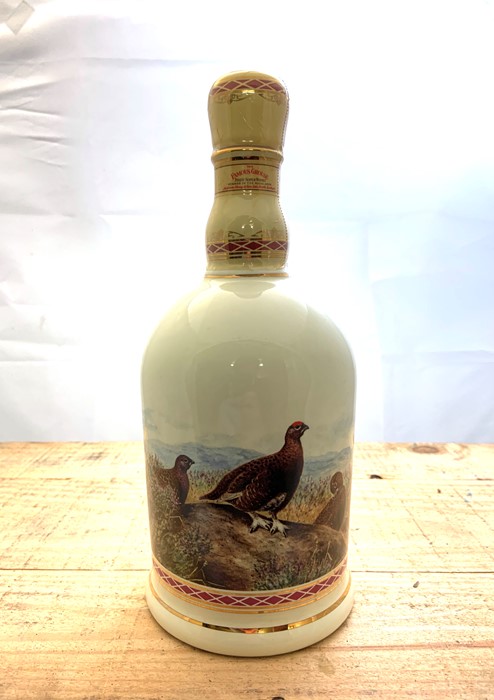 A bottle of Famous Grouse Scotch Blended Whisky in The Famous Grouse Highland Decanter by Wade. - Image 2 of 3