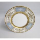 A Minton Plate decorated in Pate sur Pate and acid etched raised gilding. Signed A Pointon. Made for