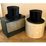 Two silk top hats - one made by Woodrow of Liverpool 1920s/30s and one by the London branch of
