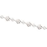 A diamond and 9ct white gold link bracelet, comprising fancy open textured plume links with