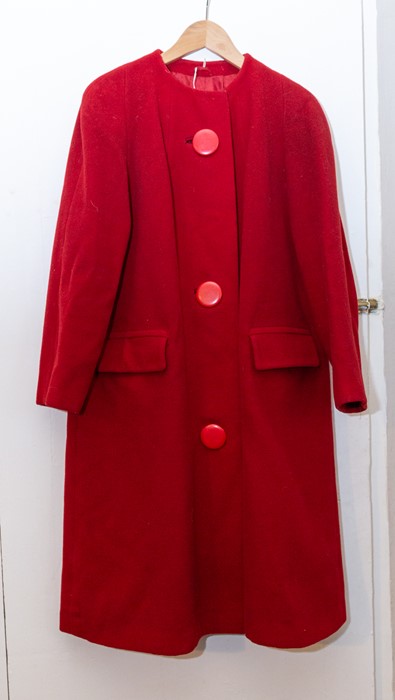 A pillar box red, early 1960's Harella wool coat, three large buttons, collarless, flap pockets; a