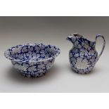 An early nineteenth century blue and white transfer printed Spode Peony pattern jug and bowl,