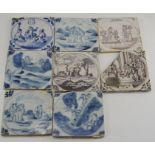 A group of four eighteenth century Bristol tin-glazed delftware blue and white hand painted tiles,
