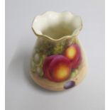 A Royal Worcester Vase, painted with fruit. Signed by Freeman  Shape G957 Date: code 1939 puce