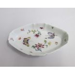 A Derby Polychrome Spoon Tray, painted with flowers and butterflies Date: circa 1758 Size: 14 x 8.