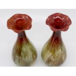 A pair of Bretby art pottery drip glaze baluster vases, with flared openings. 24 cm tall. (2)