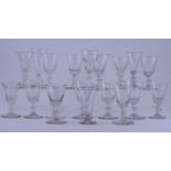 A collection of various early 19th Century and later port glasses and various other drinking