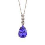 A tanzanite and diamond 14ct white gold pendant, the claw set pear cut tanzanite weighing approx.