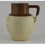 An early nineteenth century saltglazed stoneware Turner jug , circa 1800. It is decorated with a