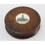 An early 19th Century turned oak souvenir snuff box, inlaid with ivory tablet commemorating The