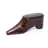 A mid 19th Century treen shoe snuff box, inlaid brass tack and lead cartouche to the sliding