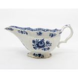 A mid eighteenth century blue and white hand-painted Bow porcelain sauce boat, circa 1762-65. It