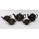 A group of nineteenth century Jackfield teapots and covers, circa 1830-60. Comprising of five