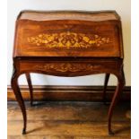 A 19th Century Louis XV revival rosewood and marquetry Bureau Du Dame, circa 1860, serpentine