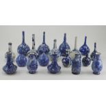 A collection of 19th Century and later English and Chinese blue and white bottleneck vases,