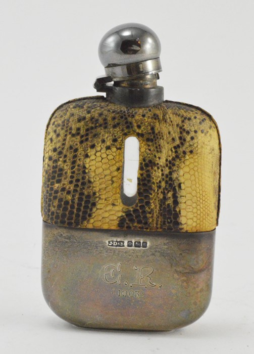 A late Victorian silver mounted glass hip flask, simulated reptile skin cover, maker Dixons,
