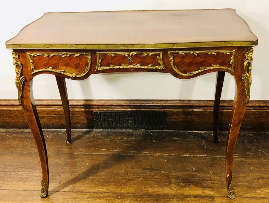 A 19th Century French kingwood and ormolu mounted side table, the top with kingwood parquetry