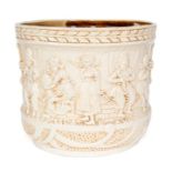 A Bretby Art Pottery moulded ivory ground jardiniere with scenic decoration of Dutch children. No.