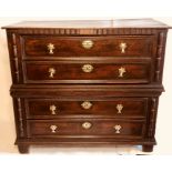 A late 17th Century oak chest of drawers in two sections, circa 1690, rectangular top, dentil