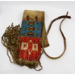 Native American Beadwork rawhide bag and a beadwork leather strap/belt.