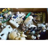 A collection of assorted figures, including a Royal Worcester figure of Queen Elizabeth II