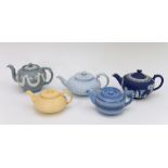 A group of nineteenth century teapots and covers, circa 1870-90. Included: A Wedgwood yellow ware