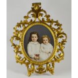 A KPM porcelain wall plaque, depicting two girls in white gowns, 19th Century, impressed KPM mark to