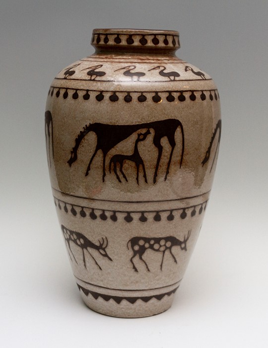 A large West German studio pottery baluster vase, decorated with a frieze of primitive or tribal