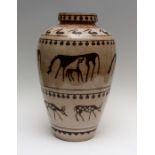 A large West German studio pottery baluster vase, decorated with a frieze of primitive or tribal