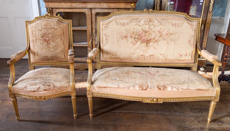 A 19th Century French piece giltwood drawing room suite, comprising a two seater settee and four - Image 2 of 2