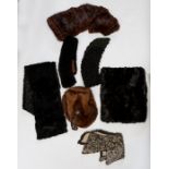 A 1930/40s Bear Skin Cape, a Mink Hat with a leather button and loops on the crown 1950s. A Shaded
