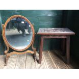 A wooden dressing table cheval style mirror plus a  wooden occasional table with carved top.
