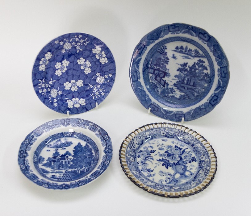 A group of four blue and white transfer printed blue and white plates, circa 1810-30. Included: A