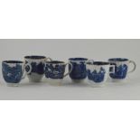 A collection of six early nineteenth century blue and white transfer coffee cups decorated with
