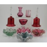 A pair of Victorian ruby glass bells (no gongs), a Mary Gregory glass beaker, a Victorian ruby glass