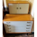 A 1970s oak veneered and white painted part bedroom suite, comprising four drawer chest and a