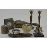A collection of assorted silverware, including a pair of candlesticks, Birmingham 1914, an