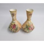 A Pair of Royal Worcester Blush Ivory Wrythen Moulded Vases  painted with flowers. Shape 1158