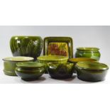 A group of Bretby art pottery green glazed bowls and a square dish with floral decoration: Largest